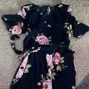 Floral romper with scalloped neckline